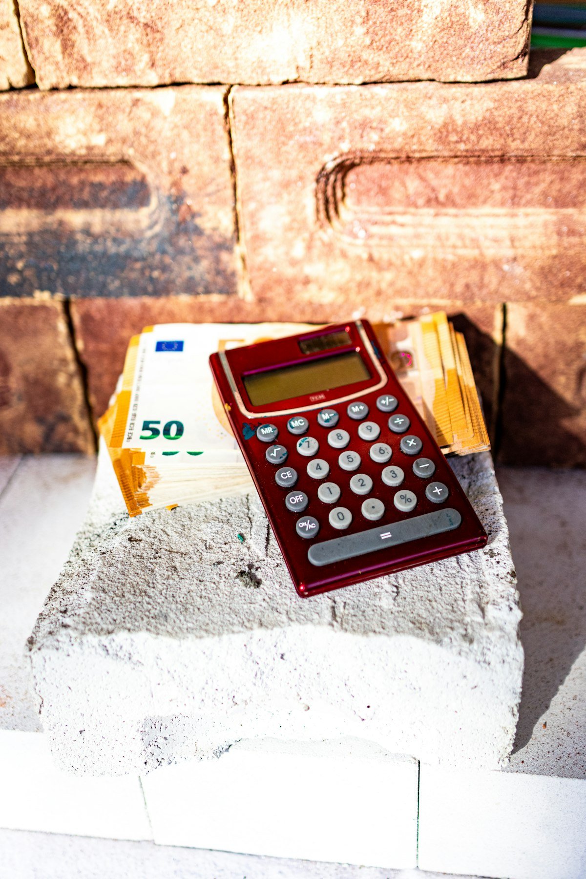 Construction professional reviewing site drawings for quantity take-off